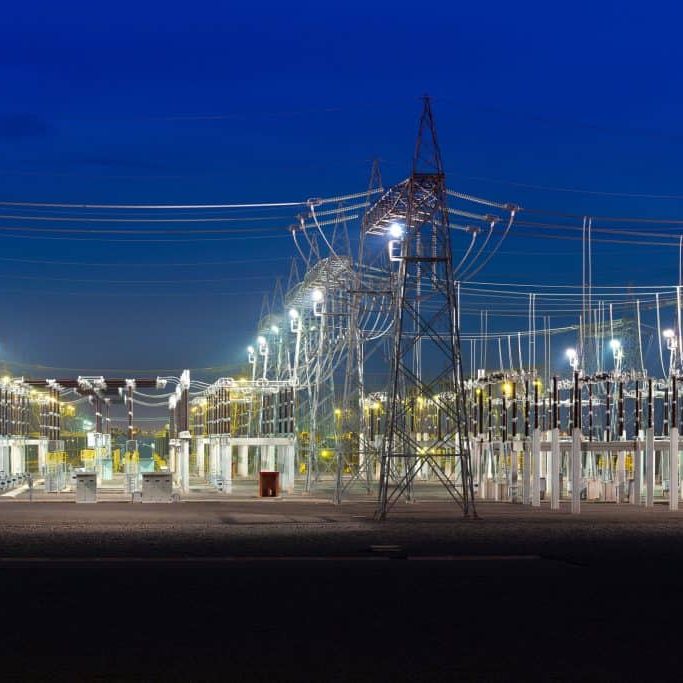 View of an electric substation at night